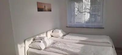Ein Bett oder Betten in einem Zimmer der Unterkunft Green Hill Apartments - Dornbirn