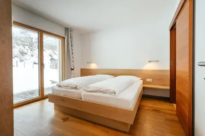 Ein Bett oder Betten in einem Zimmer der Unterkunft Landhaus Valfontana