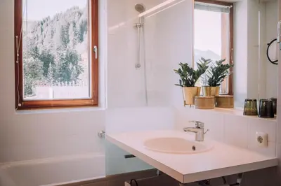 Ein Badezimmer in der Unterkunft Apartment Mohnenfluh