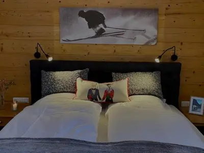 Ein Bett oder Betten in einem Zimmer der Unterkunft Landhaus Alpenland