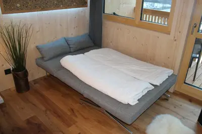 Ein Bett oder Betten in einem Zimmer der Unterkunft Apartment Bergblick-Mellau mit E-Ladesäule