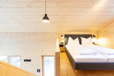 Ein Bett oder Betten in einem Zimmer der Unterkunft Masura Cabins