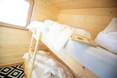Ein Bett oder Betten in einem Zimmer der Unterkunft Masura Cabins
