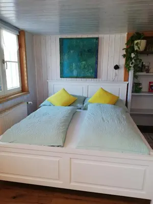 Ein Bett oder Betten in einem Zimmer der Unterkunft Gemütliche Wohnung in Einfamilienhaus
