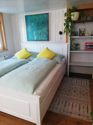 Ein Bett oder Betten in einem Zimmer der Unterkunft Gemütliche Wohnung in Einfamilienhaus
