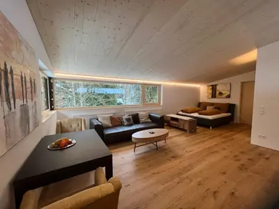 Ein Sitzbereich in der Unterkunft River Lodge