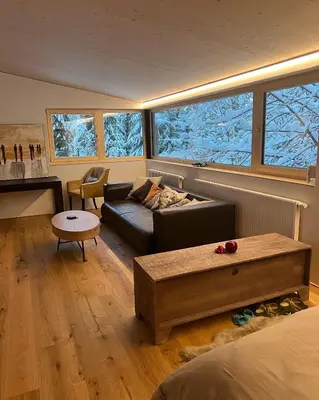 Ein Bett oder Betten in einem Zimmer der Unterkunft River Lodge