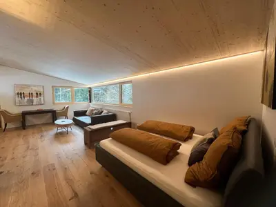Ein Sitzbereich in der Unterkunft River Lodge
