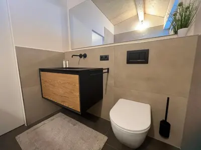 Ein Badezimmer in der Unterkunft River Lodge