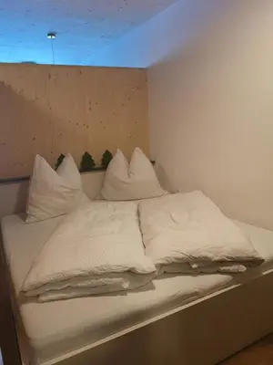 Ein Bett oder Betten in einem Zimmer der Unterkunft Apartment Almwiesen Mellau