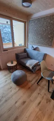 Ein Sitzbereich in der Unterkunft Apartment Almwiesen Mellau