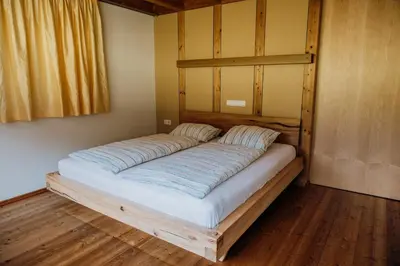 Ein Bett oder Betten in einem Zimmer der Unterkunft Ferienhaus FuchsbAu