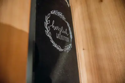 Ein Zertifikat, Auszeichnung, Logo oder anderes Dokument, das in der Unterkunft Ferienhaus FuchsbAu ausgestellt ist