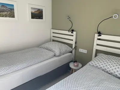 Ein Bett oder Betten in einem Zimmer der Unterkunft Alba Apartments