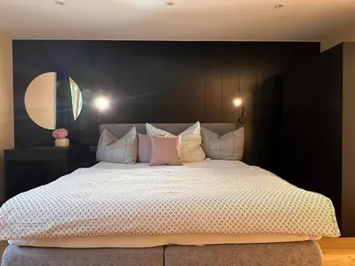 Ein Bett oder Betten in einem Zimmer der Unterkunft Alba Apartments