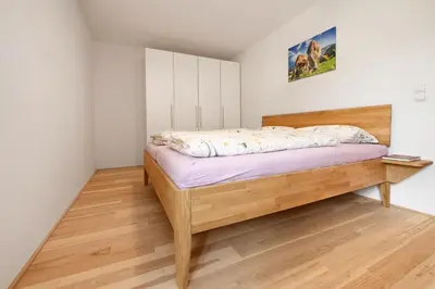 Ein Bett oder Betten in einem Zimmer der Unterkunft Ferienhof Landerleben