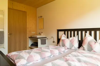 Ein Bett oder Betten in einem Zimmer der Unterkunft Bergreich Appartement 3