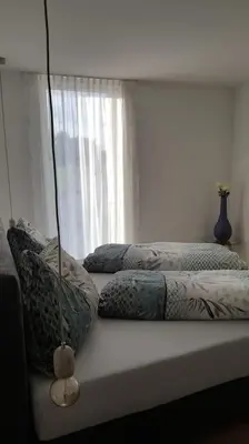 Ein Bett oder Betten in einem Zimmer der Unterkunft Schickes Ferienappartement