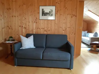 Ein Sitzbereich in der Unterkunft Rosanna