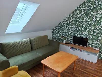 Ein Sitzbereich in der Unterkunft gemütliche Wohnung in Hohenems