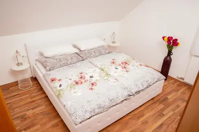 Ein Bett oder Betten in einem Zimmer der Unterkunft gemütliche Wohnung in Hohenems