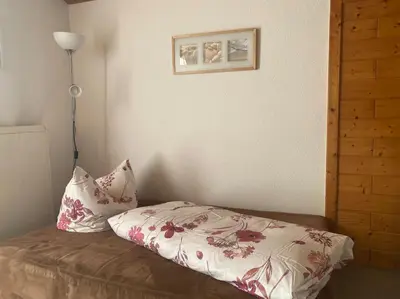 Ein Bett oder Betten in einem Zimmer der Unterkunft Panorama Wohnung Rungelin Bludenz