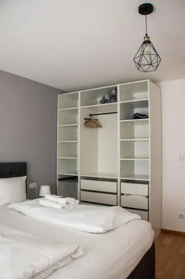 Ein Bett oder Betten in einem Zimmer der Unterkunft Stylische Stadt-Wohnung Bregenz - mit Parkplatz