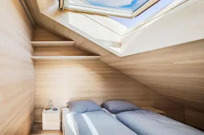 Ein Bett oder Betten in einem Zimmer der Unterkunft Ferienhaus Bergfrieden Laterns auf 1.170 m