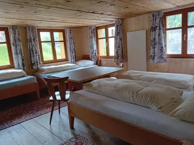 Ein Bett oder Betten in einem Zimmer der Unterkunft Pfefferhütte
