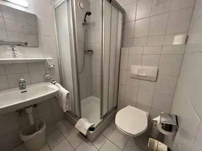 Ein Badezimmer in der Unterkunft Hotel-Pension Sternen