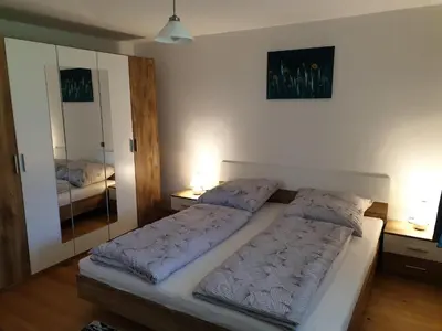 Ein Bett oder Betten in einem Zimmer der Unterkunft Ferienwohnung Suppan