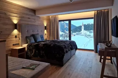Ein Bett oder Betten in einem Zimmer der Unterkunft Lech Valley Lodge