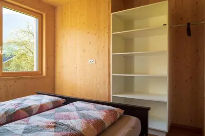 Ein Bett oder Betten in einem Zimmer der Unterkunft Bergreich Appartement 1