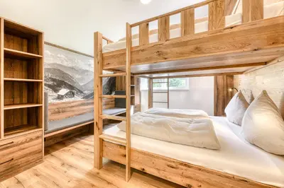 Ein Bett oder Betten in einem Zimmer der Unterkunft Brandnerhus by A-Appartments