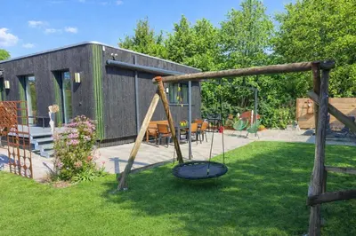 Ein Garten an der Unterkunft Ferienhaus Haus im Garten