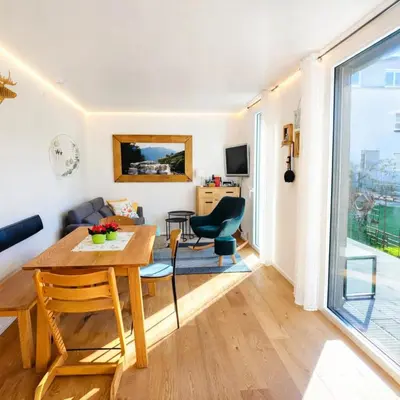 Ein Sitzbereich in der Unterkunft Ferienhaus Haus im Garten