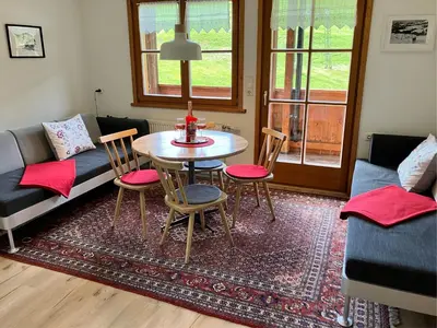Ein Sitzbereich in der Unterkunft Ferienwohnung Morgentau am Rande der Wildnis