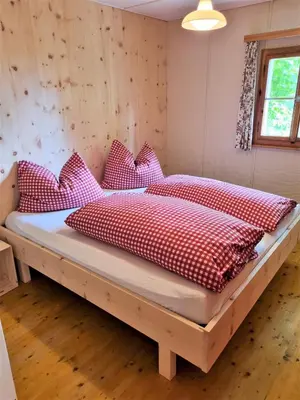 Ein Bett oder Betten in einem Zimmer der Unterkunft Haus Rheintalblick