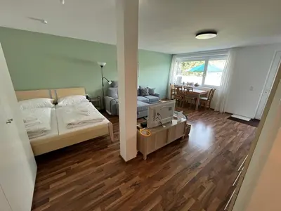 Ein Bett oder Betten in einem Zimmer der Unterkunft Schöne Wohnung in ruhiger Lage mit Garten.