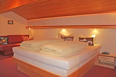 Ein Bett oder Betten in einem Zimmer der Unterkunft Appartements Garni Drei Wannen