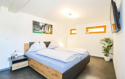 Ein Bett oder Betten in einem Zimmer der Unterkunft Ferienwohnung Sonntag