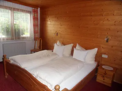 Ein Bett oder Betten in einem Zimmer der Unterkunft Haus Konzett