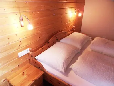 Ein Bett oder Betten in einem Zimmer der Unterkunft Haus Konzett