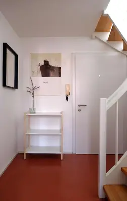 Ein Bett oder Betten in einem Zimmer der Unterkunft Bright + Cozy Dachgeschoß Maisonette im Zentrum
