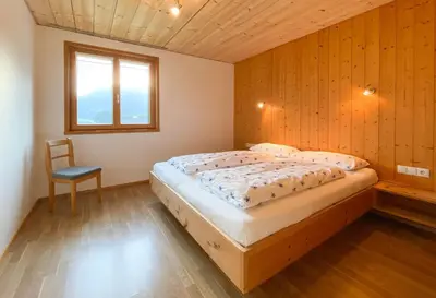 Ein Bett oder Betten in einem Zimmer der Unterkunft Haus Helga