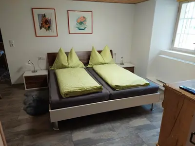 Ein Bett oder Betten in einem Zimmer der Unterkunft Alte Mühle