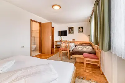 Ein Bett oder Betten in einem Zimmer der Unterkunft Gasthaus Hecht