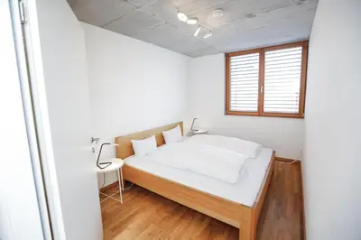 Ein Bett oder Betten in einem Zimmer der Unterkunft Gartenwohnung mit 3 Schlafzimmer in Klaus