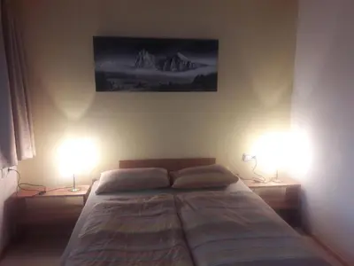 Ein Bett oder Betten in einem Zimmer der Unterkunft Ferienwohnung auf der sonnigen Südseite