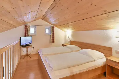 Ein Bett oder Betten in einem Zimmer der Unterkunft Apartmenthaus Steiner